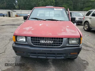 1995 Isuzu Pickup S z VIN JAACL11LXS7202252, wystawiony jako Copart lot #70393254 z przebiegiem 290 933 mil mil oraz Szkody całkowita. Historia ofert i sprzedaży dostępna na DreamBid. Obrazek 5.