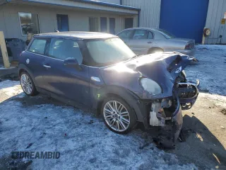 2014 MINI Hardtop S with VIN WMWXM7C51ET986340, listed as a Copart auction lot 42390825 with 71,558 mi miles and Salvage Title. Bid and sale history available at DreamBid. Image 4.