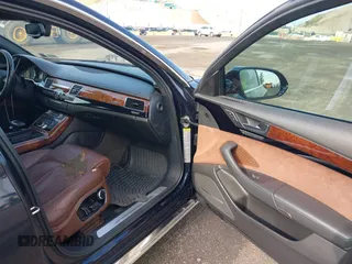 2011 Audi A8 with VIN WAURVAFD4BN018884, listed as a IAAI auction lot 42693000 with 116,952 mi miles and . Bid and sale history available at DreamBid. Image 5.