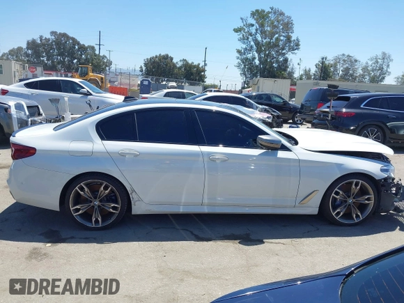2020 BMW 5 Series M550i xDrive with VIN WBAJS7C0XLCD42738, listed as a IAAI auction lot 42326945 with 50,046 mi miles and . Bid and sale history available at DreamBid. Image 13.