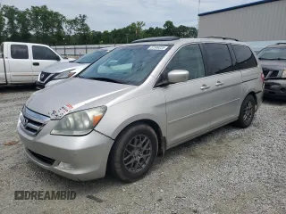 2006 Honda Odyssey Touring z VIN 5FNRL38886B000011, wystawiony jako Copart lot #57399225 z przebiegiem 256 217 mil mil oraz Szkoda całkowita • Salvage title. Historia ofert i sprzedaży dostępna na DreamBid. Obrazek 1.