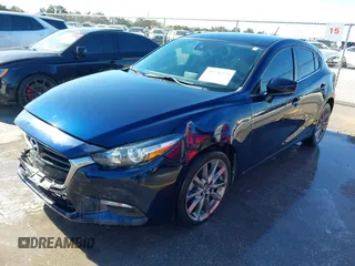 2018 Mazda 3 Touring z VIN 3MZBN1L36JM238646, wystawiony jako IAAI lot #41376772 z przebiegiem 97 261 mil mil oraz . Historia ofert i sprzedaży dostępna na DreamBid. Obrazek 19.