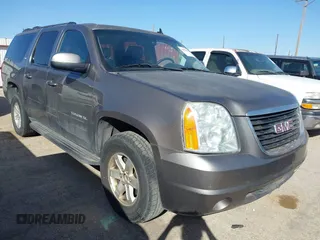 2013 GMC Yukon XL SLT with VIN 1GKS2KE70DR303872, listed as a IAAI auction lot 41659911 with 199,202 mi miles. Bid and sale history available at carsss.com. Image 1.