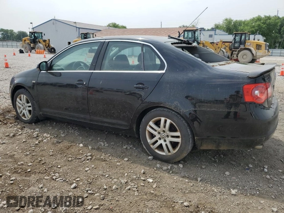 2007 Volkswagen Jetta Wolfsburg Edition z VIN 3VWEF71K77M087560, wystawiony jako Copart lot #60809985 z przebiegiem 151 561 mil mil oraz Szkoda całkowita • Salvage title. Historia ofert i sprzedaży dostępna na DreamBid. Obrazek 2.