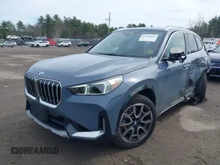 2025 BMW X1 xDrive28i with VIN WBX73EF03S5111421, listed as a IAAI auction lot 41941017 with 5,489 mi miles. Bid and sale history available at carsss.com. Image 2.