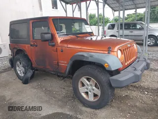 2011 Jeep Wrangler Sport with VIN 1J4AA2D15BL547454, listed as a IAAI auction lot 42604405 with Not provided miles and . Bid and sale history available at DreamBid. Image 1.