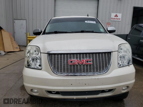 2010 GMC Yukon SLT with VIN 1GKUCCE01AR287921, listed as a Copart auction lot 50781775 with 202,301 mi miles and Salvage Title. Bid and sale history available at carsss.com. Image 5.