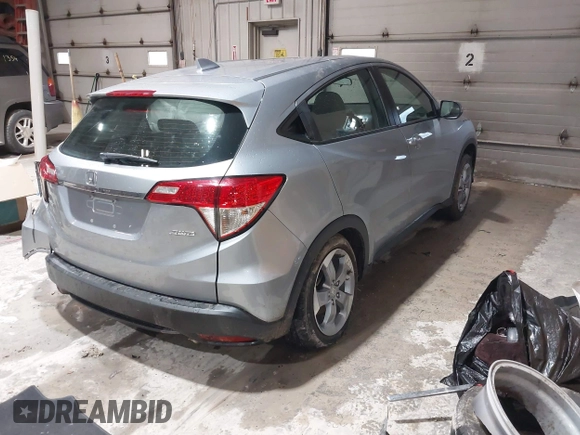 2021 Honda HR-V LX with VIN 3CZRU6H3XMM708864, listed as a IAAI auction lot 42170422 with 42,899 mi miles and . Bid and sale history available at DreamBid. Image 4.