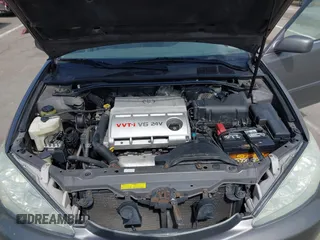 2005 Toyota Camry LE with VIN 4T1BF32K35U590150, listed as a IAAI auction lot 42053337 with 180,627 mi miles and . Bid and sale history available at DreamBid. Image 10.
