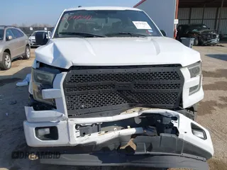 2017 Ford F-150 XL with VIN 1FTEW1CF8HKE13441, listed as a IAAI auction lot 41797041 with 185,482 mi miles and . Bid and sale history available at carsss.com. Image 6.