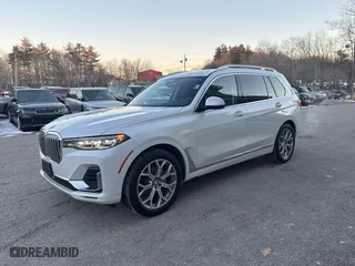 2020 BMW X7 xDrive40i with VIN 5UXCW2C05L9A03397, listed as a IAAI auction lot 41381437 with 141,656 mi miles. Bid and sale history available at carsss.com. Image 2.