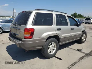 2003 Jeep Grand Cherokee Laredo with VIN 1J4GW48S23C524693, listed as a Copart auction lot 64461755 with 243,936 mi miles and Salvage title. Bid and sale history available at DreamBid. Image 3.