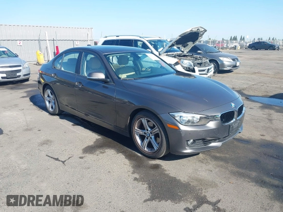 2014 BMW 3 Series 328i with VIN WBA3C1C57EK116483, listed as a IAAI auction lot 42697759 with 113,010 mi miles and . Bid and sale history available at DreamBid. Image 1.