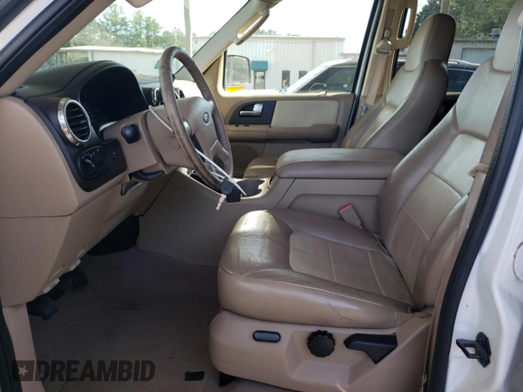 2004 Ford Expedition Eddie Bauer with VIN 1FMPU17L24LB89940, listed as a Copart auction lot 74082804 with 183,595 mi miles and Salvage Title. Bid and sale history available at carsss.com. Image 7.