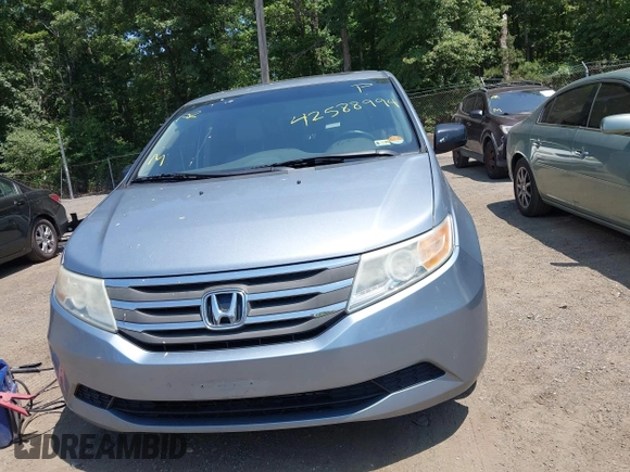2011 Honda Odyssey EX-L with VIN 5FNRL5H60BB051135, listed as a IAAI auction lot 42588994 with 195,112 mi miles and . Bid and sale history available at DreamBid. Image 12.