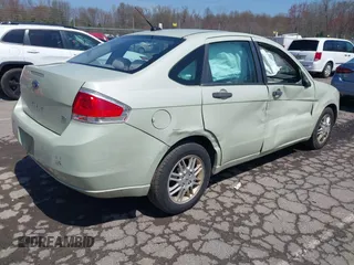 2011 Ford Focus SE with VIN 1FAHP3FN5BW182268, listed as a IAAI auction lot 42059027 with 119,368 mi miles. Bid and sale history available at carsss.com. Image 4.