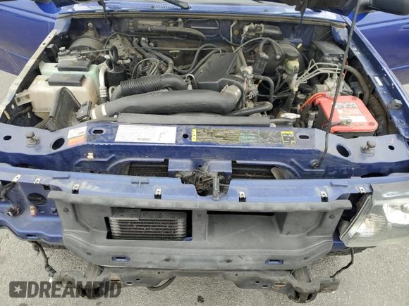 2003 Ford Ranger XL Fleet with VIN 1FTYR44V73PB03210, listed as a Copart auction lot 53499305 with 166,212 mi miles and Salvage title. Bid and sale history available at DreamBid. Image 11.