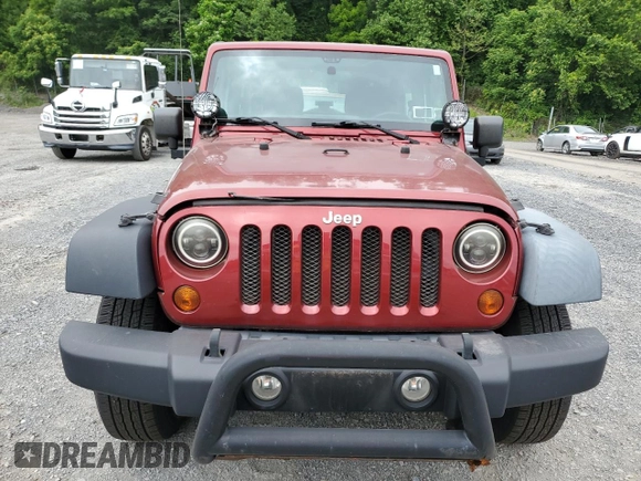 2012 Jeep Wrangler Sport with VIN 1C4AJWAGXCL173771, listed as a Copart auction lot 60336455 with 202,833 mi miles and Clean title. Bid and sale history available at DreamBid. Image 5.