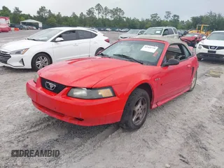 2003 Ford Mustang Deluxe with VIN 1FAFP44433F314534, listed as a IAAI auction lot 42368748 with 171,980 mi miles and . Bid and sale history available at DreamBid. Image 2.
