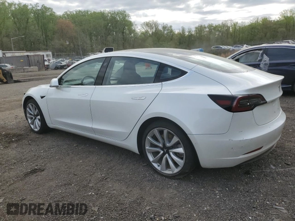 2018 Tesla Model 3 Long Range Battery with VIN 5YJ3E1EAXJF165000, listed as a Copart auction lot 53806195 with 140,448 mi miles and Clean Title. Bid and sale history available at DreamBid. Image 2.