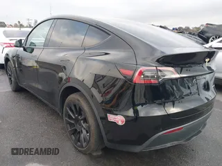 2023 Tesla Model Y Long Range with VIN 7SAYGDEE2PA024032, listed as a IAAI auction lot 41213403 with 23,418 mi miles and . Bid and sale history available at DreamBid. Image 3.