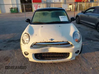 2011 MINI Hardtop with VIN WMWSU3C58BT097825, listed as a IAAI auction lot 42040442 with 141,978 mi miles and . Bid and sale history available at DreamBid. Image 12.