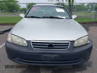 2001 Toyota Camry CE z VIN 4T1BG22K41U847401, wystawiony jako IAAI lot #42275762 z przebiegiem 202 936 mil mil oraz . Historia ofert i sprzedaży dostępna na DreamBid. Obrazek 12.
