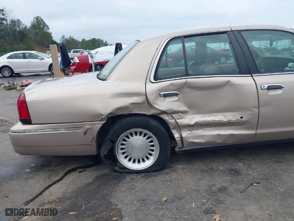 1998 Mercury Grand Marquis LS with VIN 2MEFM75W2WX695255, listed as a IAAI auction lot 41481865 with 177,365 mi miles. Bid and sale history available at carsss.com. Image 6.