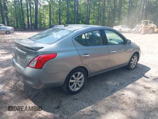 2014 Nissan Versa SV with VIN 3N1CN7AP2EL851670, listed as a IAAI auction lot 42167654 with 112,277 mi miles. Bid and sale history available at carsss.com. Image 4.