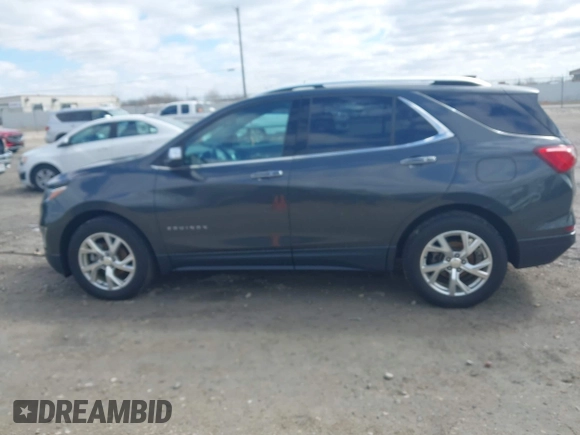 2018 Chevrolet Equinox Premier with VIN 2GNAXVEVXJ6188205, listed as a IAAI auction lot 42028868 with 93,828 mi miles and . Bid and sale history available at DreamBid. Image 14.