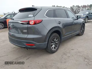 2016 Mazda CX-9 Touring with VIN JM3TCBCY7G0107632, listed as a IAAI auction lot 41721218 with 95,326 mi miles. Bid and sale history available at carsss.com. Image 4.