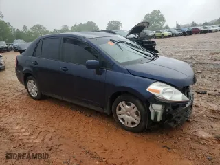 2010 Nissan Versa 1.8 S with VIN 3N1BC1APXAL377993, listed as a Copart auction lot 52870545 with 208,742 mi miles and Salvage Title. Bid and sale history available at carsss.com. Image 4.