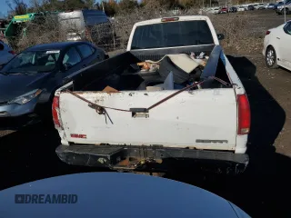 1999 GMC Sierra 1500 with VIN 1GTGC33RXXF096504, listed as a Copart auction lot 80027354 with 124,430 mi miles and Clean Title. Bid and sale history available at DreamBid. Image 6.