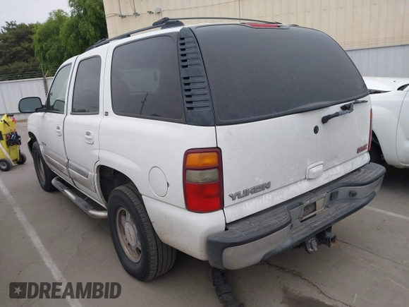 2002 GMC Yukon SLT with VIN 1GKEC13T02R313772, listed as a IAAI auction lot 42131289 with 215,164 mi miles. Bid and sale history available at carsss.com. Image 3.