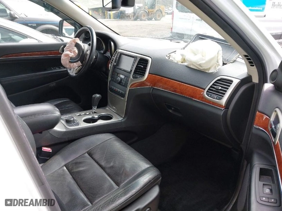 2013 Jeep Grand Cherokee Limited with VIN 1C4RJFBT0DC619216, listed as a IAAI auction lot 41703137 with 142,577 mi miles. Bid and sale history available at carsss.com. Image 5.