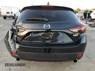 2014 Mazda 3 S Touring with VIN JM1BM1L34E1103688, listed as a Copart auction lot 79413874 with 48,667 mi miles and Salvage Title. Bid and sale history available at DreamBid. Image 6.