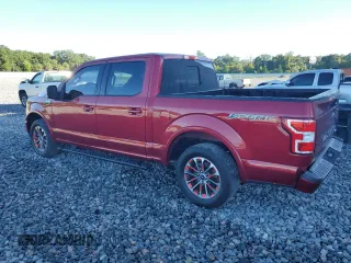 2018 Ford F-150 XL with VIN 1FTEW1CP0JFD02261, listed as a Copart auction lot 61850405 with 107,299 mi miles and Salvage title. Bid and sale history available at DreamBid. Image 2.