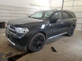 2013 Dodge Durango Crew z VIN 1C4RDJDG1DC540440, wystawiony jako Copart lot #55912855 z przebiegiem 206 890 mil mil oraz Szkoda całkowita • Salvage title. Historia ofert i sprzedaży dostępna na DreamBid. Obrazek 1.