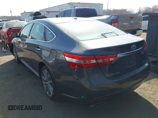 2015 Toyota Avalon Limited with VIN 4T1BK1EB5FU157586, listed as a IAAI auction lot 41827250 with 62,572 mi miles and . Bid and sale history available at carsss.com. Image 3.