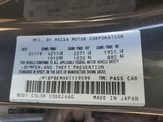 2019 Mazda 3 Premium with VIN JM1BPBEMXK1119599, listed as a Copart auction lot 71036504 with 61,371 mi miles and Salvage Title. Bid and sale history available at DreamBid. Image 12.