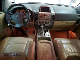 2006 Nissan Armada LE z VIN 5N1AA08B46N715720, wystawiony jako Copart lot #87299074 z przebiegiem 141 564 mil mil oraz Czysty tytuł • Clean title. Historia ofert i sprzedaży dostępna na DreamBid. Obrazek 8.