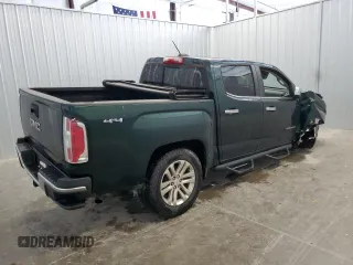 2016 GMC Canyon 4WD SLT z VIN 1GTG6DE31G1286565, wystawiony jako Copart lot #57261625 z przebiegiem 85 664 mil mil oraz Tytuł czysty. Historia ofert i sprzedaży dostępna na DreamBid. Obrazek 3.