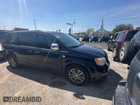 2014 Dodge Grand Caravan SXT with VIN 2C4RDGCG1ER308403, listed as a Copart auction lot 47603045 with 131,847 mi miles and Clean Title. Bid and sale history available at DreamBid. Image 1.