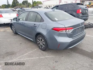 2022 Toyota Corolla Hybrid LE with VIN JTDEAMDE4NJ041913, listed as a IAAI auction lot 41883490 with 23,063 mi miles. Bid and sale history available at carsss.com. Image 3.