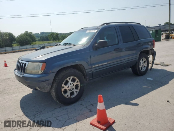 2002 Jeep Grand Cherokee Laredo with VIN 1J4GW48S92C319161, listed as a Copart auction lot 59304035 with 257,907 mi miles and Salvage title. Bid and sale history available at DreamBid. Image 1.