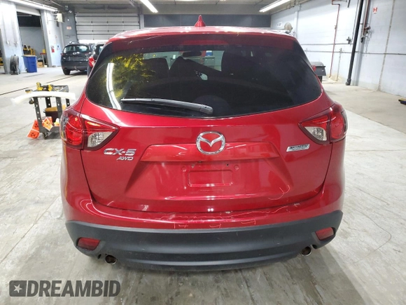 2016 Mazda CX-5 Touring z VIN JM3KE4CY6G0647362, wystawiony jako Copart lot #58081855 z przebiegiem 86 372 mil mil oraz Szkoda całkowita • Salvage title. Historia ofert i sprzedaży dostępna na DreamBid. Obrazek 6.