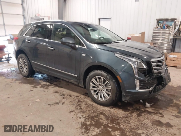 2019 Cadillac XT5 Luxury AWD z VIN 1GYKNDRS0KZ213092, wystawiony jako IAAI lot #41510497 z przebiegiem 26 030 mil mil oraz . Historia ofert i sprzedaży dostępna na DreamBid. Obrazek 1.