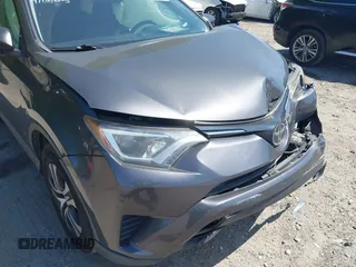 2016 Toyota RAV4 LE with VIN JTMZFREV7GJ086149, listed as a IAAI auction lot 42064251 with 90,104 mi miles and . Bid and sale history available at DreamBid. Image 17.