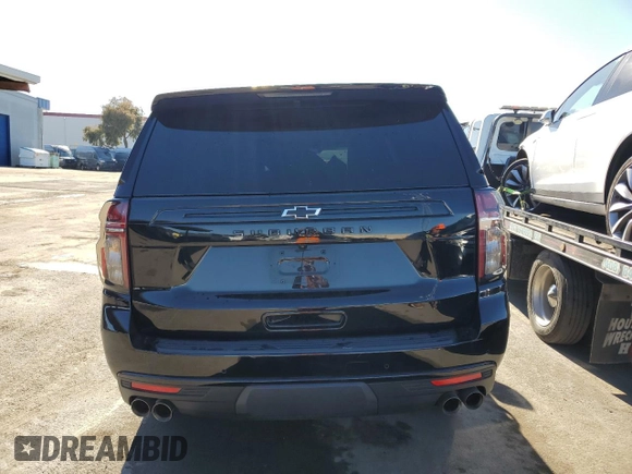 2023 Chevrolet Suburban z VIN 1GNSKDKL2PR286237, wystawiony jako Copart lot #46179735 z przebiegiem 29 518 mil mil oraz Szkoda całkowita • Salvage title. Historia ofert i sprzedaży dostępna na DreamBid. Obrazek 6.