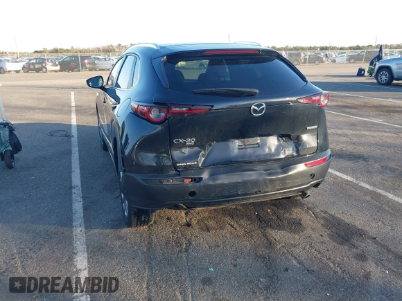 2023 Mazda CX-30 2.5 S Select Package with VIN 3MVDMBBM3PM584854, listed as a IAAI auction lot 41736925 with 39,008 mi miles. Bid and sale history available at carsss.com. Image 6.
